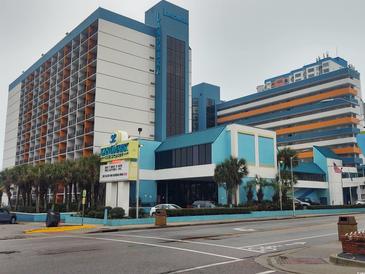 Inviting Landmark Resort featuring blue and white exterior, multiple balconies, and convenient street access at 1501 S Ocean Blvd. S # 1230, Myrtle Beach, SC 29577