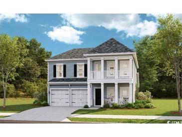 Charming two-story home featuring a double garage and a welcoming front porch at 2022 Lone Cypress Dr, Myrtle Beach, SC 29579
