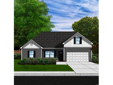 Charming single-Gathering home with a well-manicured lawn, two-car garage, and beautifully landscaped front yard at 8545 Pee Dee Hwy., Conway, SC 29527