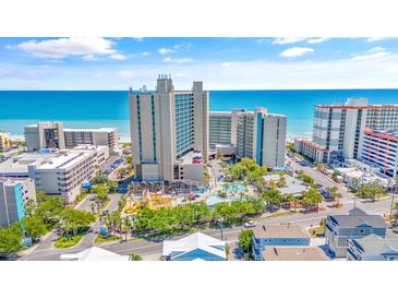 Beautiful aerial view of a beachside condo resort with ocean views, pools, and easy beach access at 201 74Th Ave. N # 703, Myrtle Beach, SC 29572