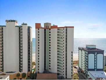 Exterior of a beachfront condo with balconies and ocean views on a sunny day at 2700 N Ocean Blvd. # 1053, Myrtle Beach, SC 29577