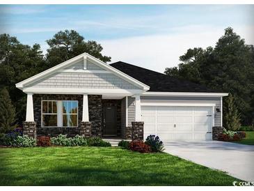Charming single-story home featuring stone accents, a two-car garage, and a well-maintained lawn at 4307 Falls Oaks St., Myrtle Beach, SC 29579