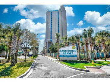Sand Dunes Resort with beautiful landscaping and views of the blue skies and lush palm trees at 201 74Th Ave. N # 2549/2550, Myrtle Beach, SC 29577