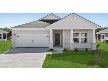 Charming one-story home with white brick, a two-car garage, a well-manicured lawn and a welcoming front porch at 2020 Copper Creek Loop, Longs, SC 29568