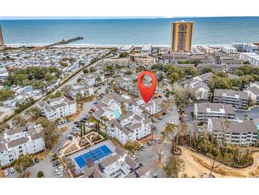 Wonderful aerial view of a condo community near the beach with a tennis court, pool and beautiful landscaping at 351 Lake Arrowhead Rd. # 12-347, Myrtle Beach, SC 29572