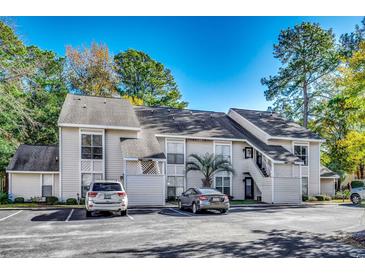 Inviting condo with well-maintained landscaping and ample parking at 4466 Little River Inn Ln. # 906, Little River, SC 29566