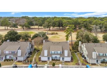 Golf course-adjacent townhomes boast meticulously maintained landscapes and convenient parking at 503 20Th Ave. N # 45D, North Myrtle Beach, SC 29582