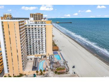 Enjoy oceanfront living with a pool, sandy beach and pier views from this high-rise condo at 9550 Shore Dr. # 1511, Myrtle Beach, SC 29572