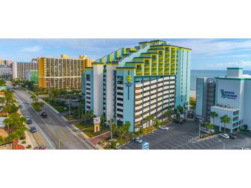 Beautiful ocean-front Monterey Bay Suites resort featuring colorful architecture, on-site parking, and beautiful landscaping at 6804 N Ocean Blvd. # 1639, Myrtle Beach, SC 29572
