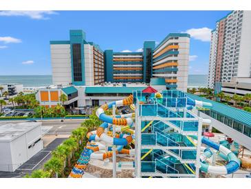 Resort waterpark featuring slides and multi-story buildings with ocean views at 1501 S Ocean Blvd. S # 1147, Myrtle Beach, SC 29577