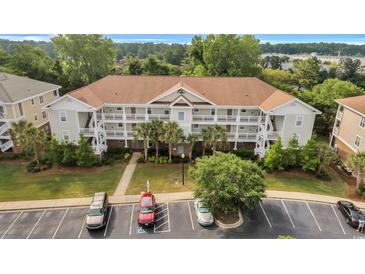 The condos overlook the waterway and golf course at 5801 Oyster Catcher Dr. # 1623, North Myrtle Beach, SC 29582