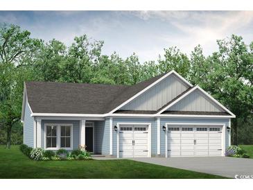 Charming one-story home featuring a three-car garage and light blue siding against a backdrop of lush green trees at 521 Sheepbridge Way, Loris, SC 29569