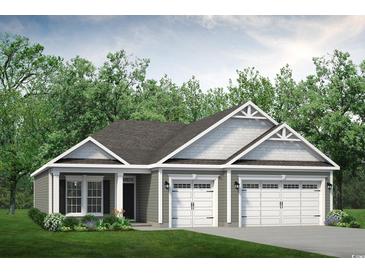 Charming single-story home featuring a two-car garage, gray siding, and a beautifully landscaped front yard at 759 St. Vincent Loop, Little River, SC 29566