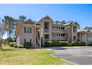 Inviting multi-level condo complex with manicured landscaping and ample parking at 366 Pinehurst Ln. # 13E, Pawleys Island, SC 29585