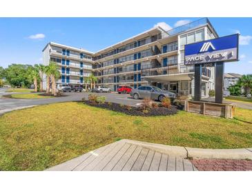 Pace View I exterior showcases a well-maintained facade, landscaping, and convenient parking at 2010 S Ocean Blvd., Myrtle Beach, SC 29577