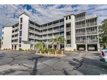 Spacious condo featuring multiple balconies and ample parking at 305 N Hillside Dr. N # 103, North Myrtle Beach, SC 29582