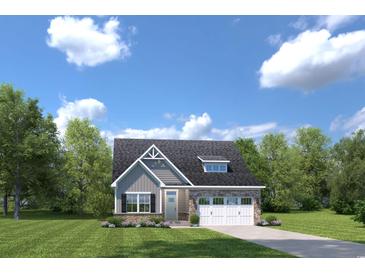 Charming single-Gathering home with stone accents, a two-car garage, and beautiful landscaping at 2254 Hazel Way, Longs, SC 29568