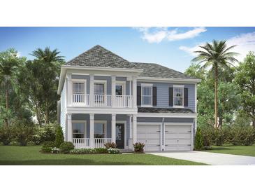 Charming two-story home with a covered porch and a two-car garage, perfect for comfortable living at 8723 Baton Rouge Ave Nw, Calabash, NC 28467