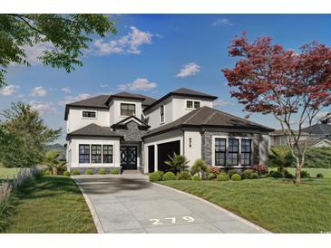Stunning two-story home featuring a modern design, stone accents, and a well-manicured lawn at 1315 Ashboro Ct., Myrtle Beach, SC 29579