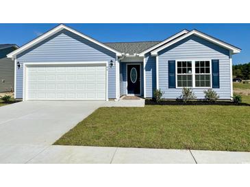 Charming one-story home with a blue exterior, well-manicured lawn, and a convenient two-car garage at 875 Owls Nest Dr., Conway, SC 29527