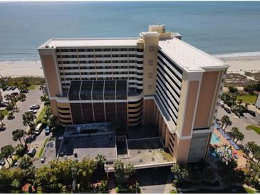 An aerial view of the resort complex with beach access and an ocean view at 6900 N Ocean Blvd. # 1034, Myrtle Beach, SC 29579