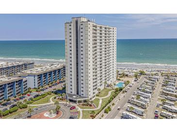 Expansive aerial view of an oceanfront high-rise building with RV park, pool and beach access at 5905 S Kings Hwy. # 1612, Myrtle Beach, SC 29575