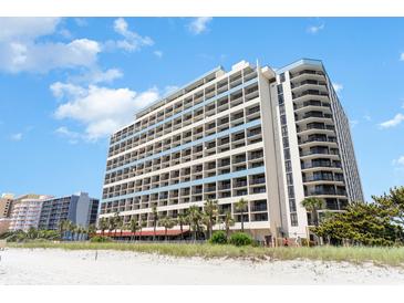Beautiful beachfront condo featuring palm trees, beach access, and multiple floors at 7100 N Ocean Blvd. N # 912, Myrtle Beach, SC 29572