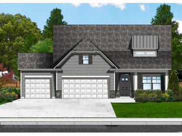 Charming two-story home with a three car garage and landscaped front yard provides a welcoming curb appeal at 224 Palmetto Sand Loop, Conway, SC 29527