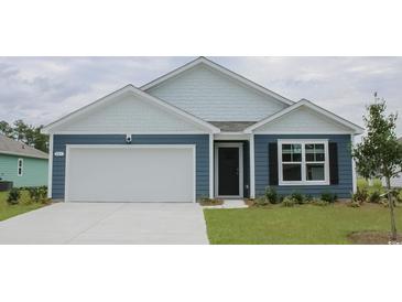 Charming single-story home with blue siding, white trim, and an attached two-car garage at 377 Rookroost Circle, Conway, SC 29526