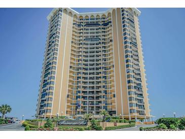 Beautiful exterior view of a tall oceanfront condo building featuring multiple balconies at 9650 Shore Dr. # 810, Myrtle Beach, SC 29572