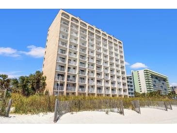 Behold this multi-story building boasting a facade with countless balconies, perfect for enjoying scenic views at 1207 S Ocean Blvd. S # 51107, Myrtle Beach, SC 29577