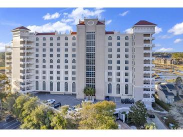 Stunning high-rise condominium building boasting meticulous architectural details and beautiful landscaping at 9547 Edgerton Dr. # 702, Myrtle Beach, SC 29572