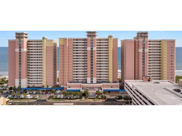 Beautiful exterior of a beachfront hotel with multiple towers and a parking garage at 2711 S Ocean Blvd. # 621, North Myrtle Beach, SC 29582