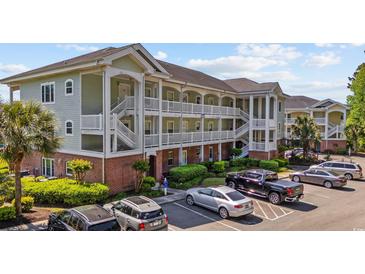 Attractive condo building featuring multiple floors, staircases and parking at 1514 Lanterns Rest Rd. # 304, Myrtle Beach, SC 29579