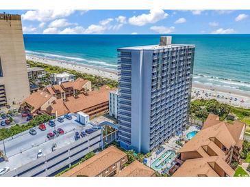 Beautiful high-rise condo building with beach access, pool, and ample parking near the ocean at 5511 N Ocean Blvd. # 209, Myrtle Beach, SC 29577