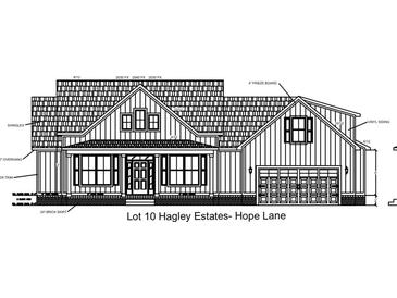 Detailed elevation of home with brick skirt, vinyl siding, shingles, frieze board, covered porch and garage at 11 Hope Ln., Pawleys Island, SC 29585