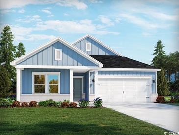 Charming single-Gathering home with light blue siding, white trim, and a two-car garage at 863 Cypress Preserve Circle, Longs, SC 29568