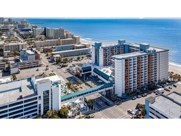 Expansive aerial view of a beachfront condo complex with pools and ocean views at 1501 S Ocean Blvd. # 842, Myrtle Beach, SC 29577