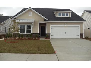 Charming single-Gathering home with a two-car garage and well-maintained landscaping at 8727 Baton Rouge Ave Nw, Calabash, NC 28467