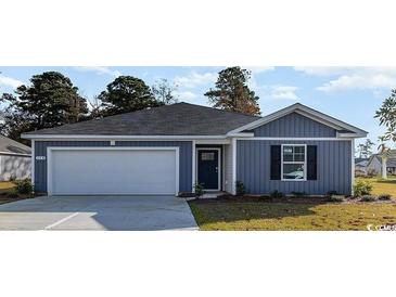 Charming single-story home with a two-car garage and manicured lawn at 5153 Yellowstone Dr., Conway, SC 29526