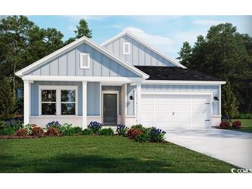 Charming single-story home with light blue siding, a two-car garage, and well-maintained landscaping at 1559 Regal Fern Way, Longs, SC 29568