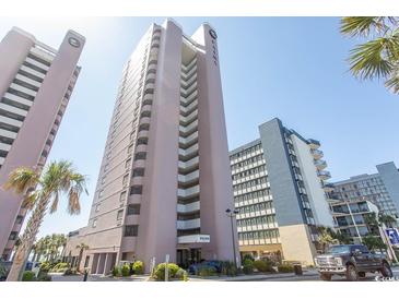 Low angle of condo building with palm trees and blue sky at 2406 N Ocean Blvd. # 803, Myrtle Beach, SC 29577