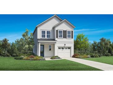 Charming two-story home with white siding, black shutters, and well-manicured lawn and garden beds at 2440 Hillbourne Loop, North Myrtle Beach, SC 29582