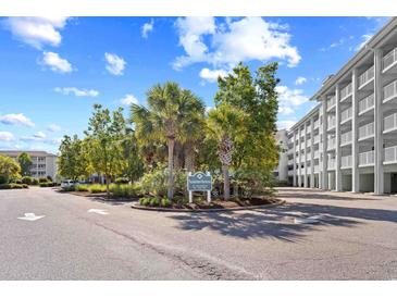 Community entrance with lush landscaping and a welcoming Summerhouse sign at 14290 Ocean Highway # 222, Pawleys Island, SC 29585