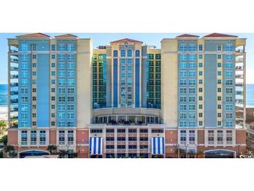 Luxury beachfront condo building featuring multiple floors, balconies, and ocean views at 603 S Ocean Blvd. # 912, North Myrtle Beach, SC 29582