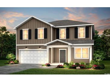 Two-story home featuring board and batten siding, black shutters, and a two-car garage at 1011 Laconic Dr., Myrtle Beach, SC 29588