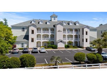 Beautiful condo complex boasting lovely landscaping, lots of parking, and multiple floors with balconies at 1025 World Tour Blvd. # 301, Myrtle Beach, SC 29579