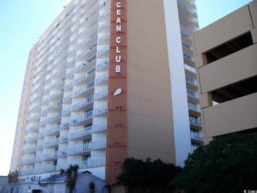 View of Ocean Club building featuring multiple floors, balconies, and garage at 9550 Shore Dr. # 1728, Myrtle Beach, SC 29572
