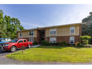 Attractive multi-Gathering building with well-maintained lawn, parking for residents, and convenient access at 1015 Elm St. # 18, Conway, SC 29526