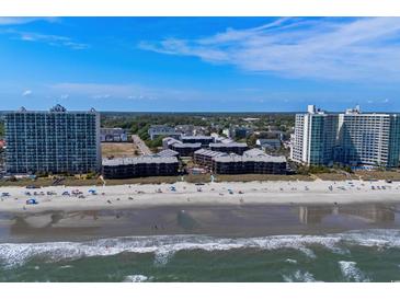Wide aerial shot of the oceanfront property, beach and building complex at 108 N Ocean Blvd. # 308, North Myrtle Beach, SC 29582